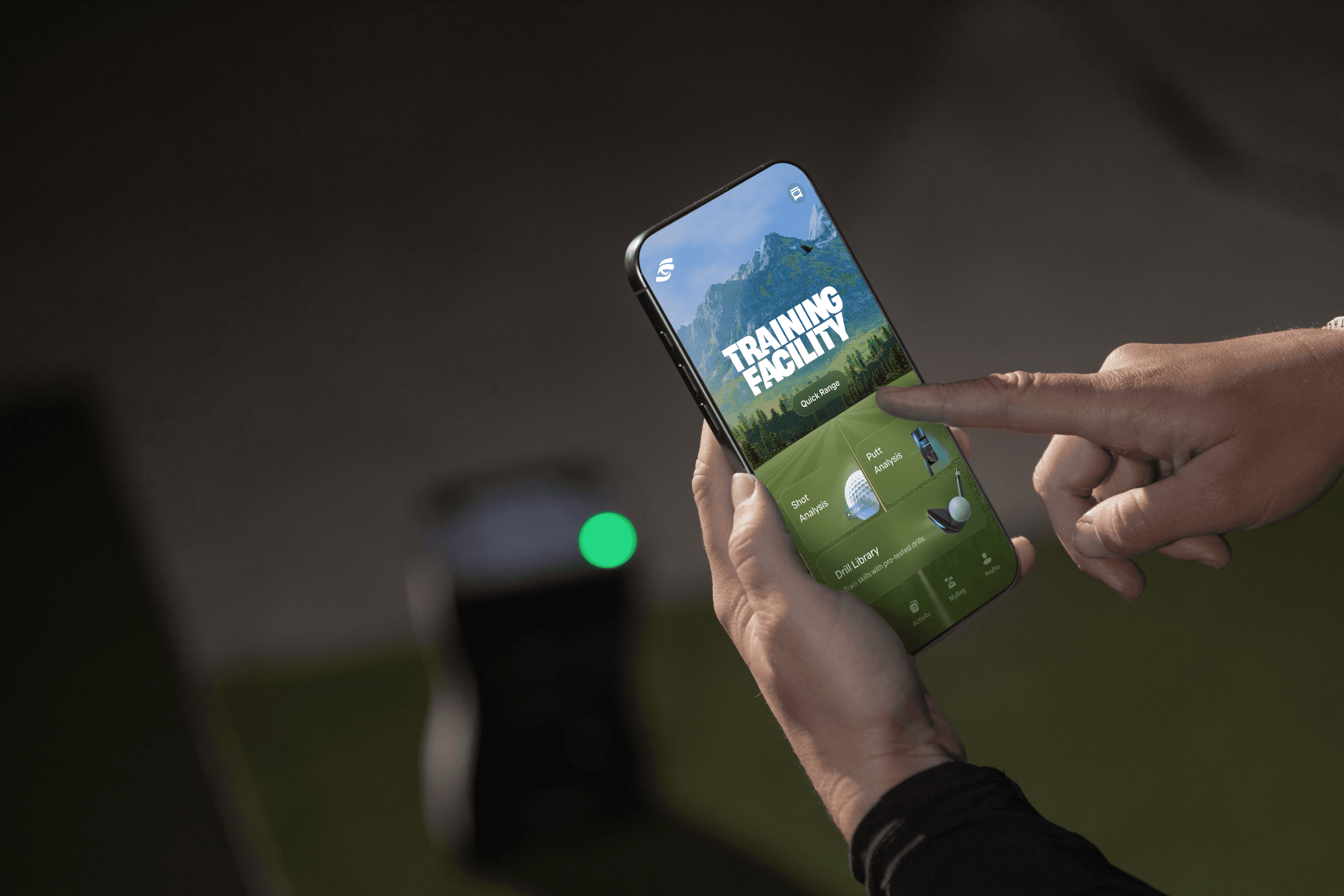 Phone mockup showing training facility held in hands